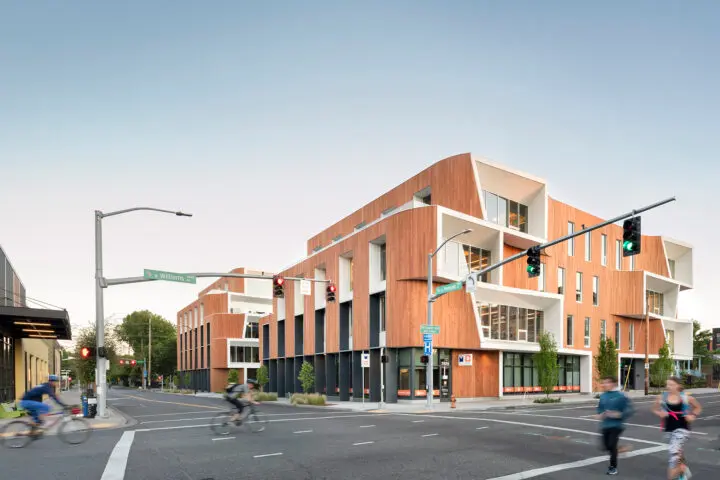 Looking across the intersection at Fremont and Williams, One North's southeast corner features ground-floor retail spaces beneath three levels of dynamically curving offices.